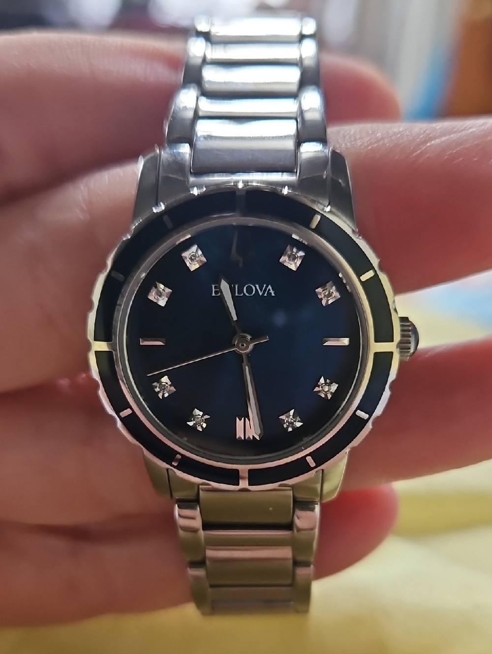 Bulova Women's Silver Watch with Blue Dial and Crystal Markers